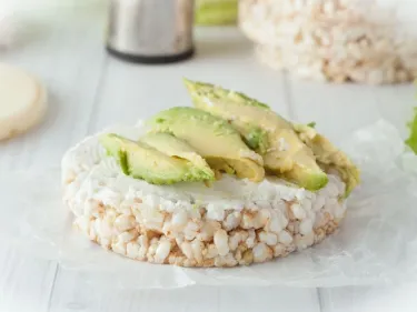 Rice cake with avocado and cream cheese